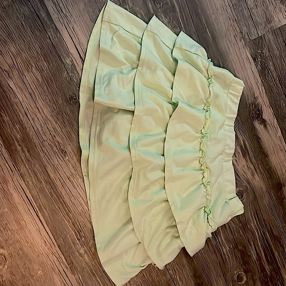 Green ruffled skirt